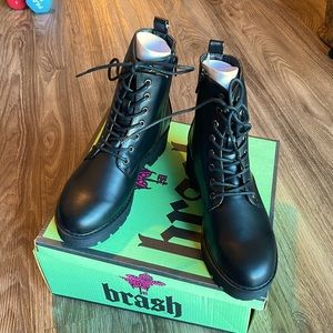 Brand new with tags, never worn, Woman’s combat boots.